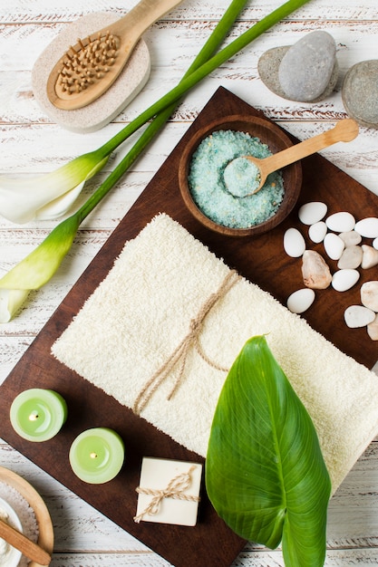 Flat lay spa decoration on wooden background